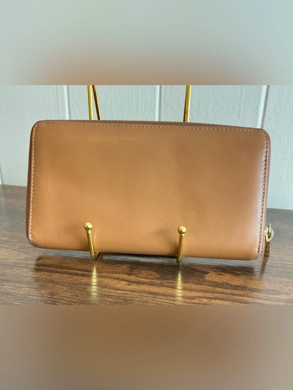 A rare vintage Adrienne Vittadini cognac color zip around leather wallet